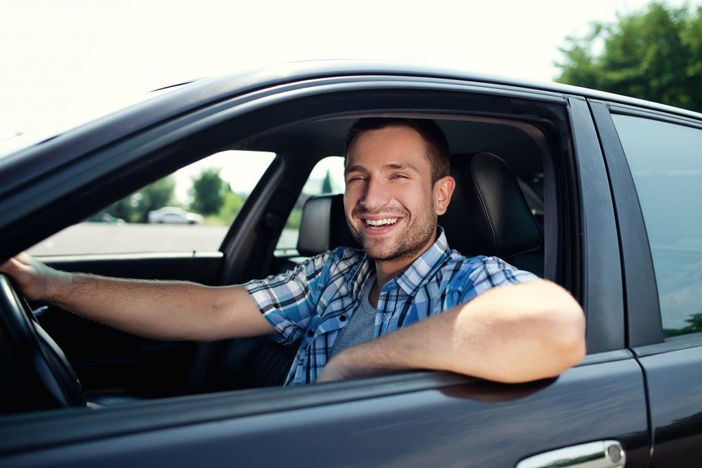 man inside a car